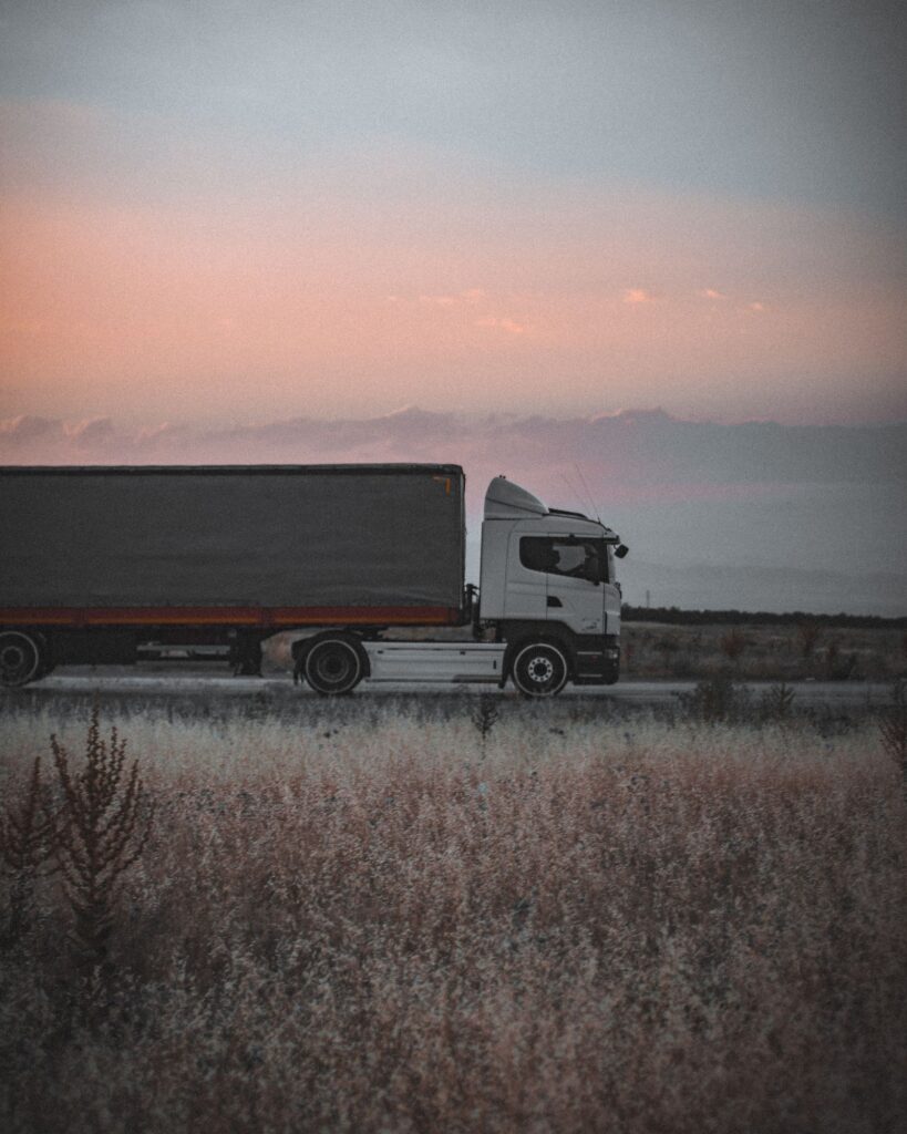 Cargo truck on the highway carrying goods