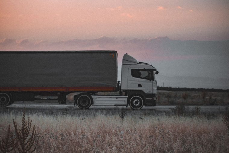Cargo truck on the highway carrying goods